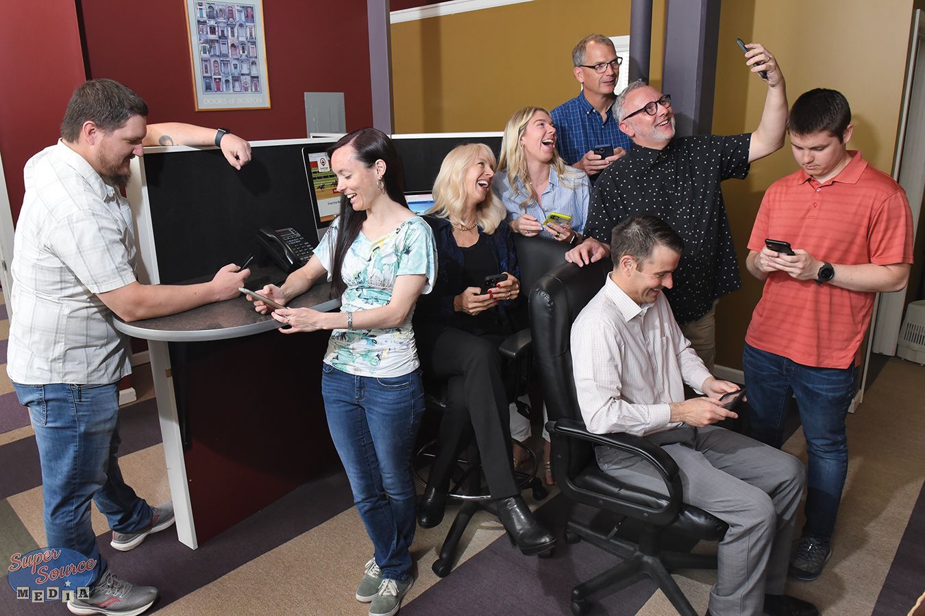 Mannix Marketing group taking a selfie and laughing