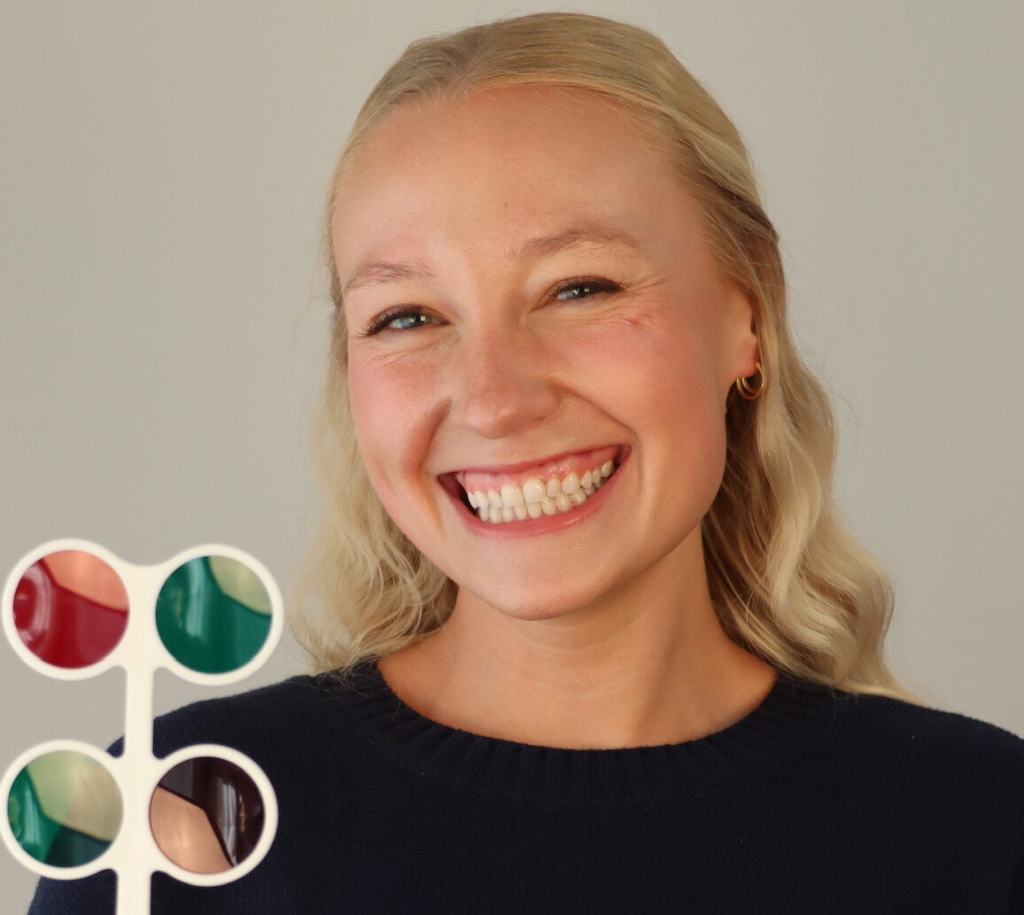 girl with blonde hair smiling close up