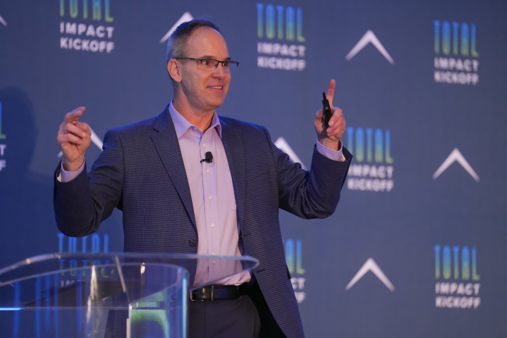 Local entrepreneur Dave Borland speaking at the 2025 Total Impact Kick-Off, in Atlanta, Georgia.