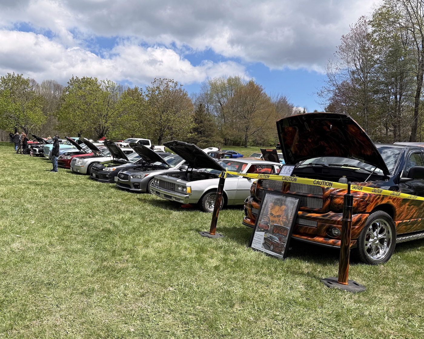 line of fancy cars at cornell's 2026 car show in greenfield center ny