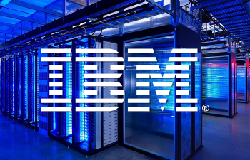white IBM logo with quantum lab in background