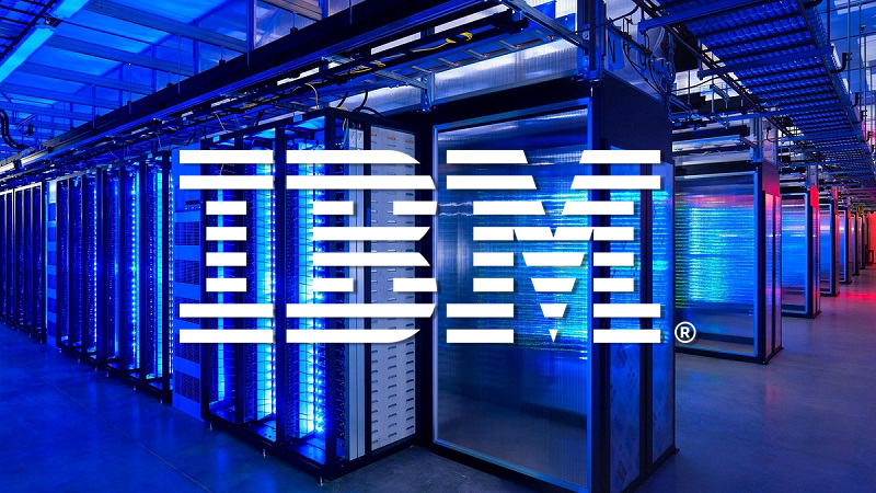 white IBM logo with quantum lab in background