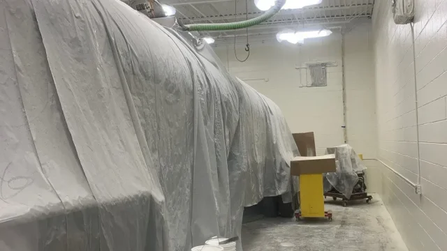 Covered equipment in a workshop