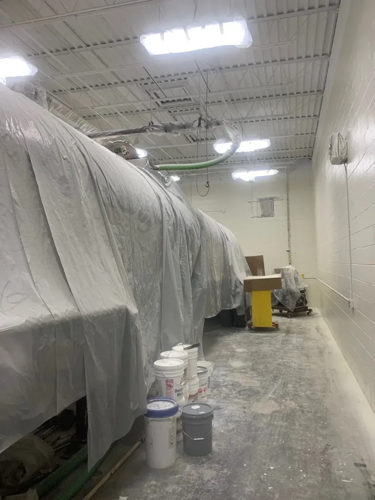 Covered equipment in a workshop